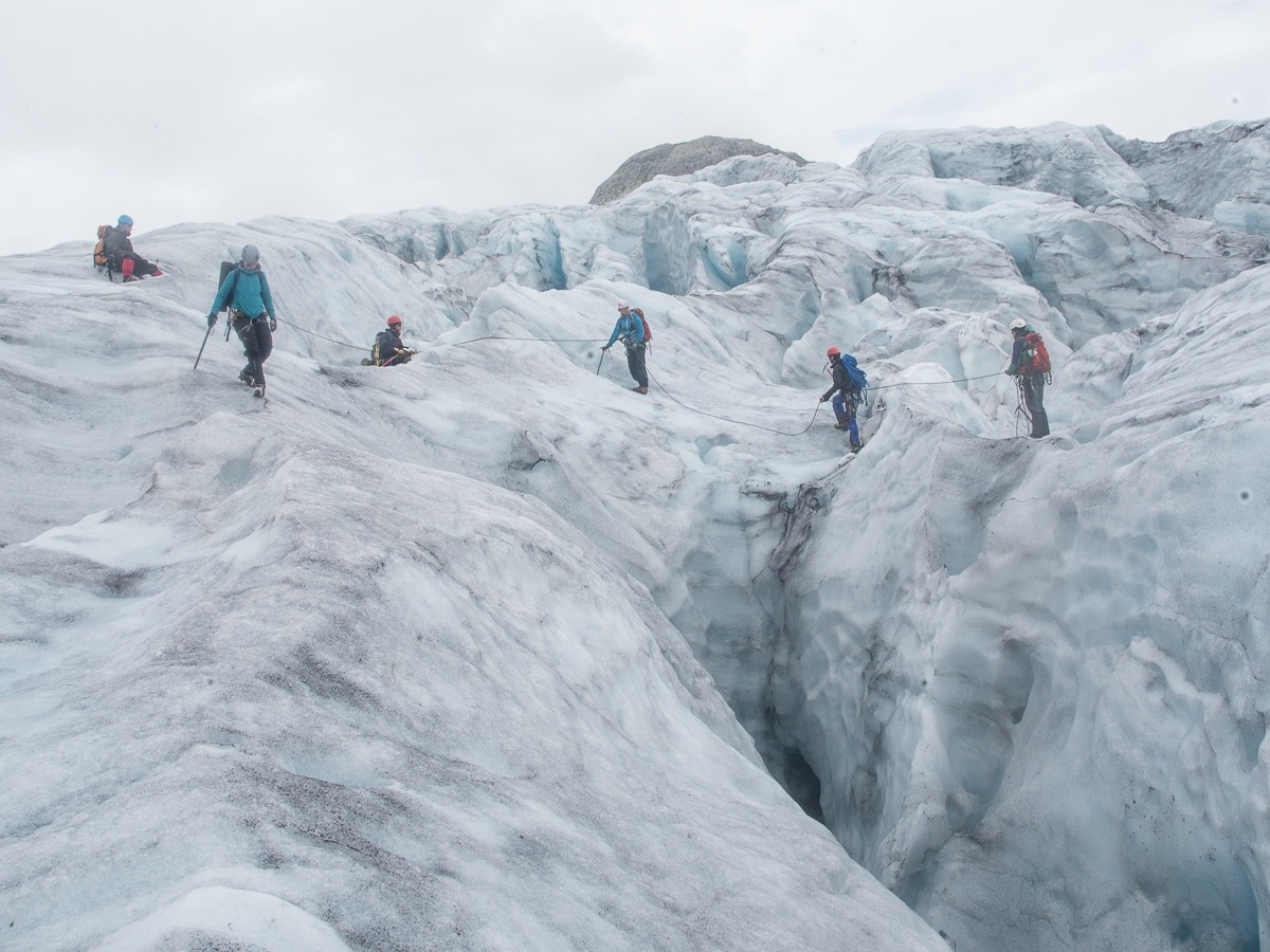 Roped team crossing crevassed ice on Jostedalsbreen